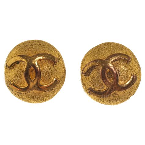 chanel logo earrings markings